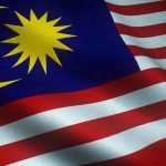 A closeup shot of the waving flag of Malaysia with interesting textures