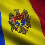 A closeup shot of the waving flag of Moldova with interesting textures