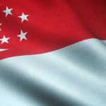 A closeup shot of the waving flag of Singapore with interesting textures